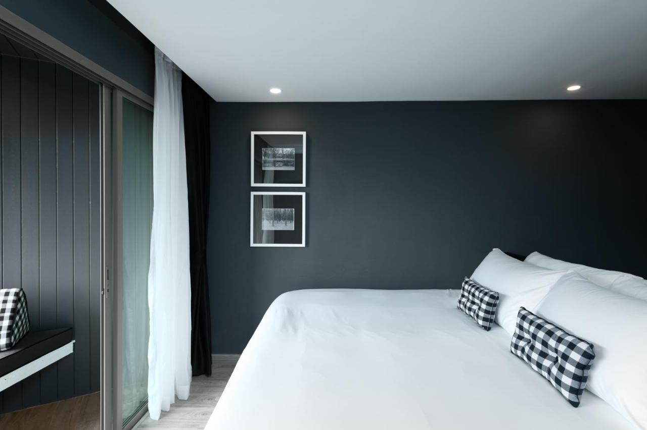 Foto Hotel Phuket Beachfront Bagian luar foto A bedroom